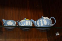 A WEDGWOOD BLUE JASPERWARE THREE PIECE TEA SERVICE
