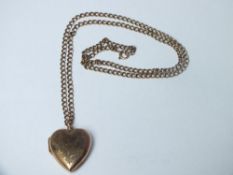 A LARGE 9CT GOLD BACK & FRONT LOCKET ON CHAIN