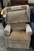A BROWN UPHOLSTERED RISE / RECLINE ARMCHAIR