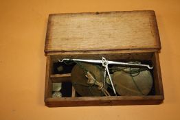 AN OAK CASED SET OF ANTIQUE SCALES & WEIGHTS