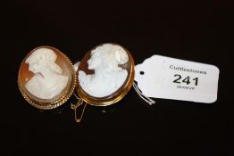 TWO CAMEO BROOCHES, one mounted in hallmarked 9 carat gold, the other in 750 stamped yellow metal, H