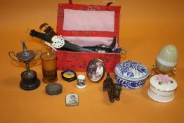 A BOX OF COLLECTABLE TO INCLUDE A MINIATURE GOLFING TROPHY, WRISTWATCHES ETC
