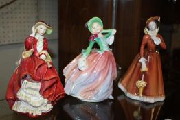 THREE ROYAL DOULTON LADY FIGURES COMPRISING OF 'TOP O THE HILL' HN 1834, 'JULIA' HN2705 AND '