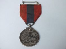 A SILVER IMPERIAL SERVICE MEDAL