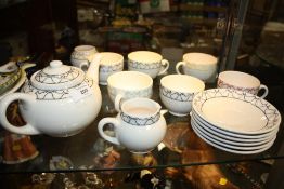 A MODERN MOORCROFT BIRD PATTERN SIX PERSON HARLEQUIN COLOURED TEA SET