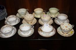 A COLLECTION OF VINTAGE PARAGON AND OTHER GILDED CHINA CUPS AND SAUCERS (11)