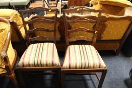 A PAIR OF MAHOGANY DINING CHAIRS