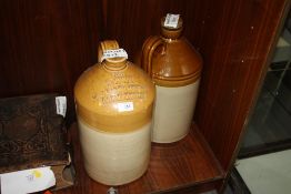 A LARGE STONEWARE FLAGON ADVERTISING W.FINCH WINE AND SPIRIT MERCHANTS CARMARTHEN, TOGETHER WITH