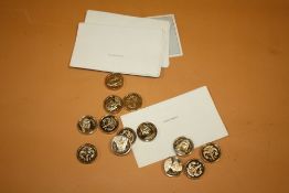 A COLLECTION OF GOLD PLATED THE FRANKLIN MINT THE EXCALIBUR BACKGAMMON SET PIECES