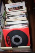 A BOX OF 7 INCH SINGLES TO INCLUDE IRON MAIDEN, BLACK SABBATH, JUDAS PRIEST ETC