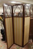 AN EDWARDIAN MAHOGANY GLAZED THREE FOLD SCREEN, W 135 CM