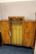 A WALNUT GLAZED DISPLAY CABINET WITH HAIRY PAW FEET, W 136 CM
