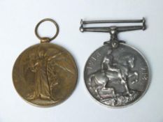 A PAIR OF WWI MEDALS - C . BURNETT & R . WARICK REG