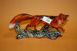 A SIGNED ANITA HARRIS ART POTTERY FOX FIGURE