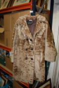 A FRED PHIPPS FUR COAT