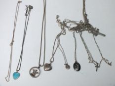 TEN SILVER NECKLACES
