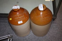 A PAIR OF LARGE STONEWARE FLAGONS ADVERTISING ANSELLS BREWERY LIMITED OF BIRMINGHAM