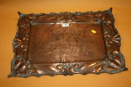 AN ARTS AND CRAFTS HAMMERED FINISH COPPER WALL HANGING TRAY