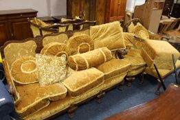 A WALNUT THREE PIECE UPHOLSTERED SUITE WITH A LONG FOOTSTOOL AND AN UPHOLSTERED FOOTSTOOL (5)
