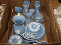 A BOX OF BLUE WEDGWOOD JASPERWARE TO INCLUDE VASES, PIN DISHES ETC.