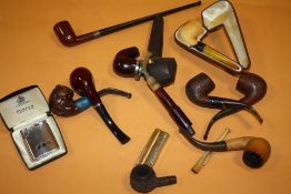A QUANTITY OF VINTAGE PIPES AND LIGHTERS ETC