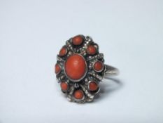 A VINTAGE SILVER & CORAL RING