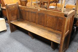 AN OAK VINTAGE PEW, W 185 CM
