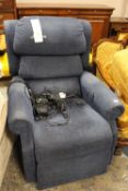 A BLUE UPHOLSTERED RISE / RECLINE ARMCHAIR