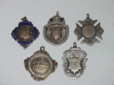 FIVE ANTIQUE SILVER FOB MEDALS