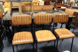 A SET OF EIGHT MODERN TAN LEATHER DINING CHAIRS