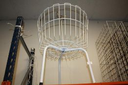 A RETRO STYLE REVOLVING SHOP DISPLAY BASKET