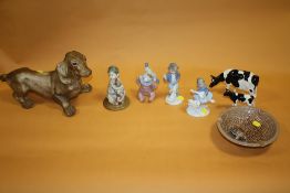 A COLLECTION OF CERAMIC FIGURES ETC TO INCLUDE A NAO EXAMPLE, COLUMBIAN DOG FIGURE, WADE BOWL ETC (