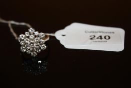 AN 18CT GOLD DIAMOND CLUSTER RING, estimated 1.6 carats in totalCondition Report:Ring size N