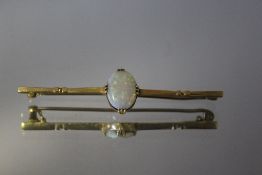 A 15CT OPAL STOCK PIN, approx weight 5g, W 6 cm