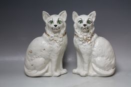 A PAIR OF LATE 19TH / EARLY 20TH CENTURY STAFFORDSHIRE CATS, with registration marks to base, H 31