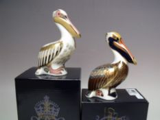 A ROYAL CROWN DERBY LIMITED EDITION WHITE PELICAN PAPERWEIGHT, gold stopper,429 / 5000, with box and