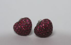 A PAIR OF THEO FENNELL OF LONDON 18CT WHITE GOLD HEART SHAPED RUBY EAR STUDS FROM THE 'ART'
