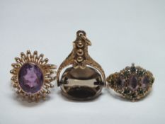 AN ANTIQUE STYLE GEMSET YELLOW METAL RING, together with an amethyst and yellow metal dress ring -