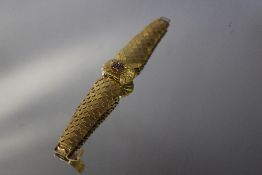 A LADIES HALLMARKED 18 CARAT GOLD VERTEX REVUE COCKTAIL WATCH, with clip cover that has central