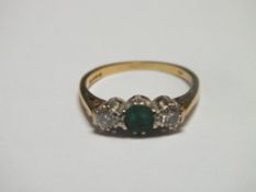 A HALLMARKED 18 CT GOLD EMERALD AND DIAMOND RING, approx weight 2.8g, ring size M