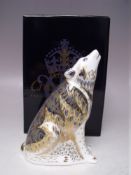 A ROYAL CROWN DERBY WOLF PAPERWEIGHT, gold stopper, with box, H 14 cm
