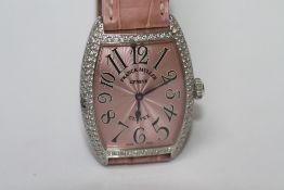 A LADIES FRANCK MULLER 'CINTREE CURVEX' 18CT WHITE GOLD AND DIAMOND WRISTWATCH, the shaped face