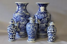 A PAIR OF CHINESE BLUE AND WHITE BALUSTER VASES, each with an all over floral pattern, H 30 cm,