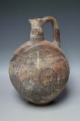 A CYPRIOT BLACK ON RED WARE TERRACOTTA JUG - CYPRO-ARCHAIC - CIRCA 750-600 BC, the globular body