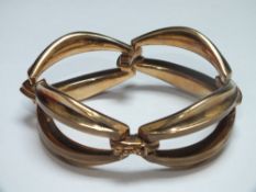 AN UNUSUAL YELLOW METAL LARGE FOUR LINK PANEL BRACELET MARKED 9K AND .375, overall L 21 cm, approx