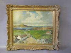 CIRCLE OF JAMES HUMBERT CRAIG (1878-1944). Irish school, stormy mountainous lough scene with