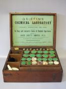 A 19TH CENTURY MAHOGANY CASED CHEMISTS SET, the hinged lid opening to reveal fitted contents, the