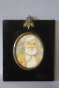 (XIX-XX). Indian school, oval portrait miniature on ivory, study of a bearded man, unsigned,