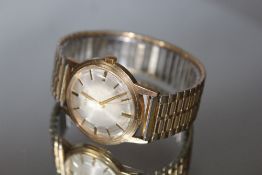 A HALLMARKED 9 CT GOLD GARRARD WRIST WATCH, on expanding bracelet, Dia 3.25 cmCondition Report: