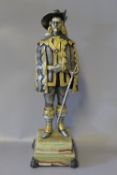 A GIUSEPPE VASARI ITALIAN GILT AND SILVERED BRONZE MODEL OF A CAVALIER, H 27 cm